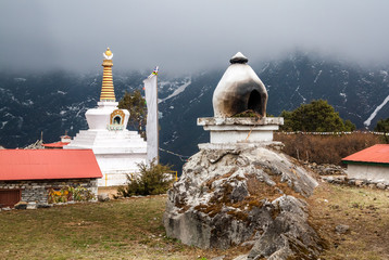 Buddhist places of worship - a furnace for burning incense and B