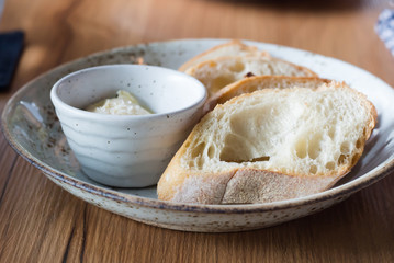 Slices of white bread with butter
