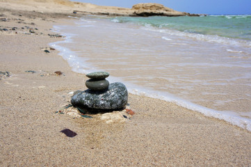 Fototapeta na wymiar Meditation zen stones on sand