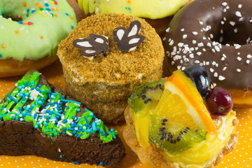 Different kinds of cakes. Shortbread cake with fruit. Brown brow