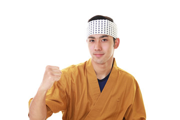 ガッツポーズの寿司職人