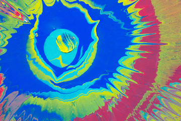 Fototapeta na wymiar Mustard, blue and red paint splashes on the cardboard.