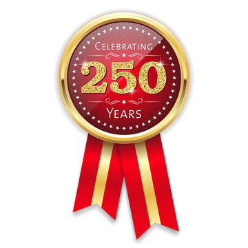 Red celebrating 250 years badge, rosette with gold border and ribbon