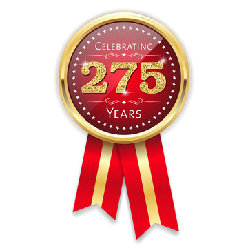 Red celebrating 275 years badge, rosette with gold border and ribbon