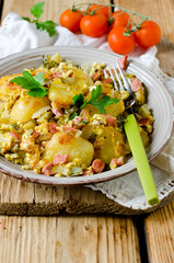 Fried potatoes with ham and pickles