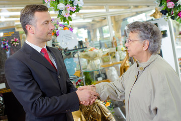 elderly woman in the funeral store