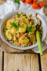 Fried potatoes with ham and pickles
