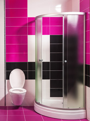 modern bathroom with shower and stylish tiles in pink and white