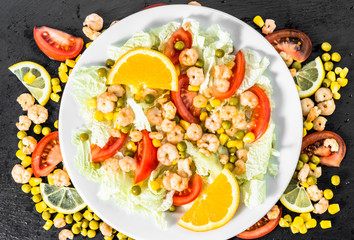 Colorful vegetable salad with prawns and vegetables, mediterrane