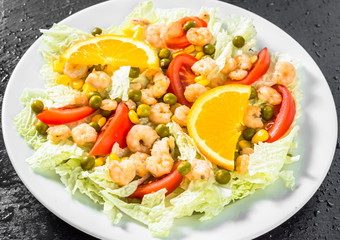 Colorful vegetable salad with shrimps and vegetables, mediterran