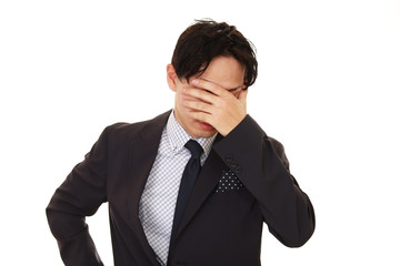 苦悩するビジネスマン