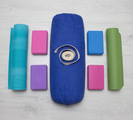 iyengar yoga props blocks, strap, roller and carpet