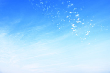 Fototapeta na wymiar Fuzzy and soft clouds on blue sky
