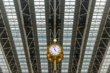 Fototapeta na wymiar Clock tower in space time of osaka station
