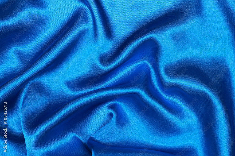 Poster curved design on blue silk for pattern and background