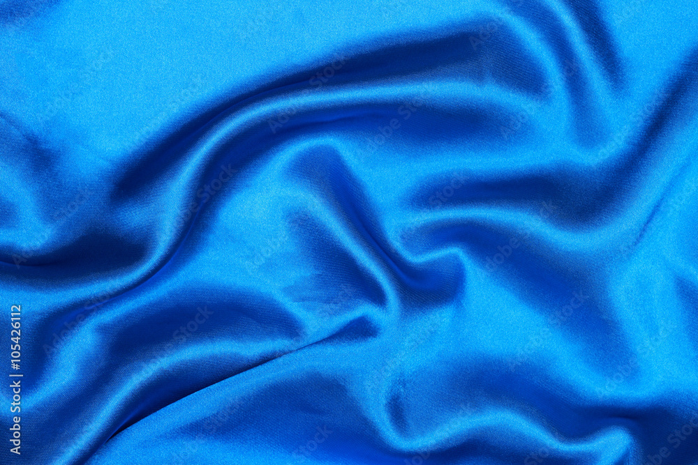 Poster curved design on blue silk for pattern and background