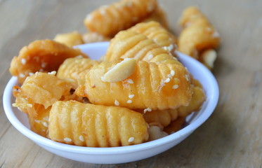 crispy caramel dressing white sesame and nut Thai snack on cup