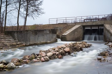 Fototapeta premium Long exposure photo of dam on river.