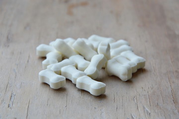 goat milk pallet for feeding pet on wooden board