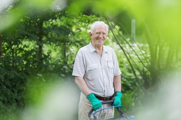 Happy senior gardener