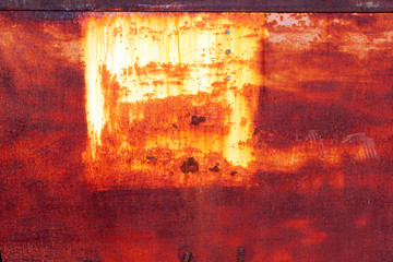 Rusty scratched painted metal surface