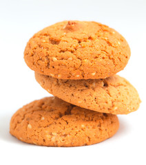 Macro oatmeal cookies isolated on white.