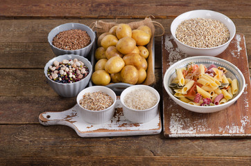 Healthy Food: Best Sources of Carbs on wooden board.