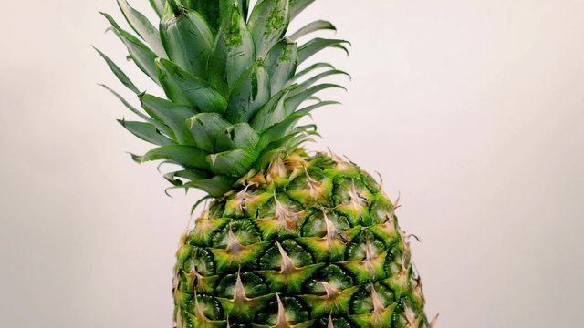 Pineapple Rotating On White Background
