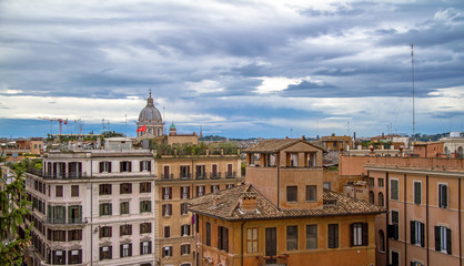 Fototapeta na wymiar cityscape view from Piazza di Spagna during cloudy day in Rome, Italy 