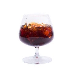 Studio isolated splashing whiskey over white background. Clipping path included.