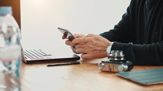 Creative Business Man working with laptop in his of his office / agency 