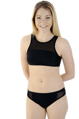 Obraz premium Frau trägt Sportbekleidung für Training und Fitness 