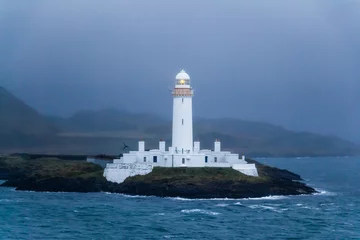 Crédence de cuisine en verre imprimé Phare Lismore lighthouse in Scotland at dusk