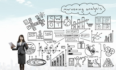 Businesswoman sketching her ideas