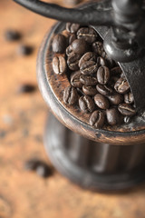 Coffee beans in the coffee mill top view