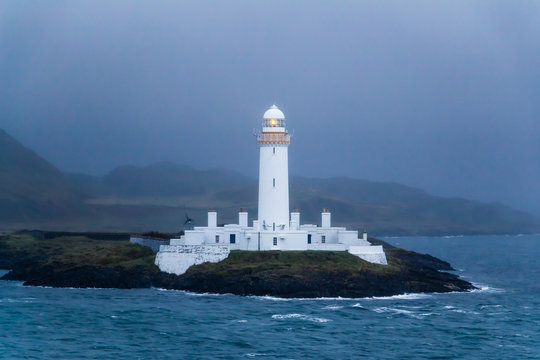 Lismore lighthouse in Scotland at dusk