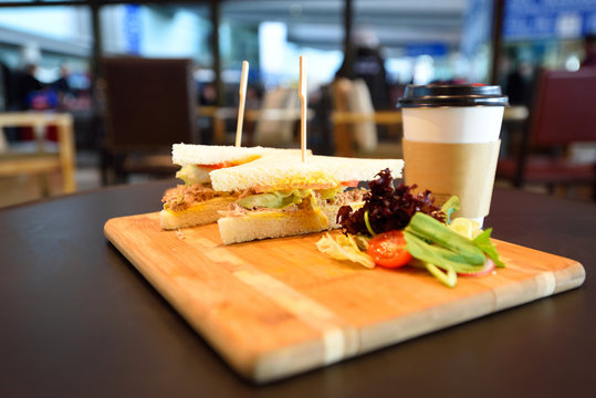 Sandwich and coffee in coffee shop in Terminal of Airport.