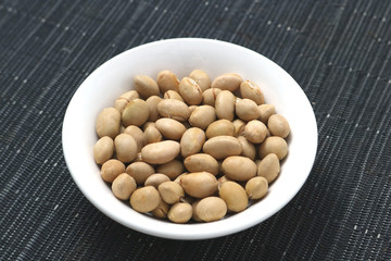 Soybeans in white round dish