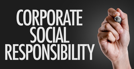 Hand writing the text: Corporate Social Responsibilitiy