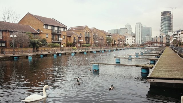 Residential area in London with a canal on foreground
