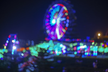 Blur image of modern light at the theme park with bokeh effect.