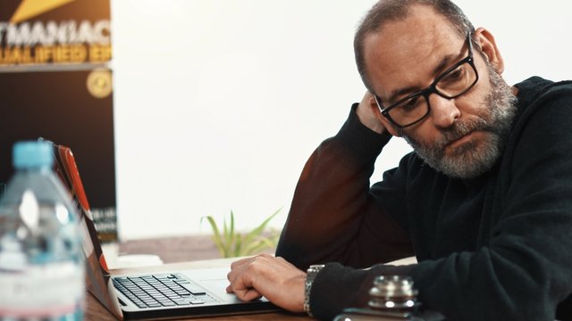 Waiting Businessman in small business office