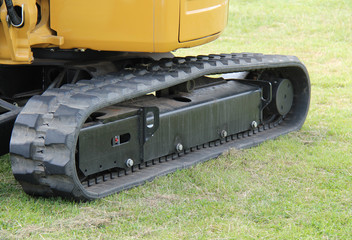 The Rubber Tracks of a Mechanical Excavator Vehicle. © daseaford