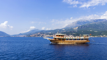 walking tourist ship off the coast of Montenegro