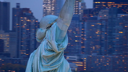 Statue of Liberty at dusk, closeup aerial shot