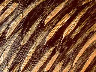 Golden acrylic brushstrokes in brown