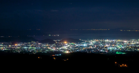 Aerial view of night scene of city. Cityscape of Hakone city in Japan, Asia.