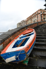 Fototapeta na wymiar boat moored on the stairs