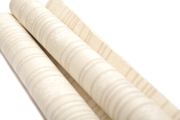 Roll of vinyl wallpapers on white background