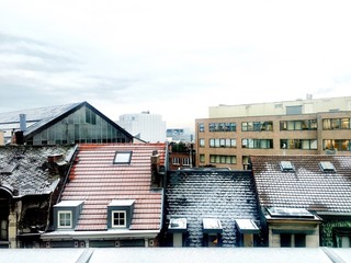 Snowy roofs in the city
